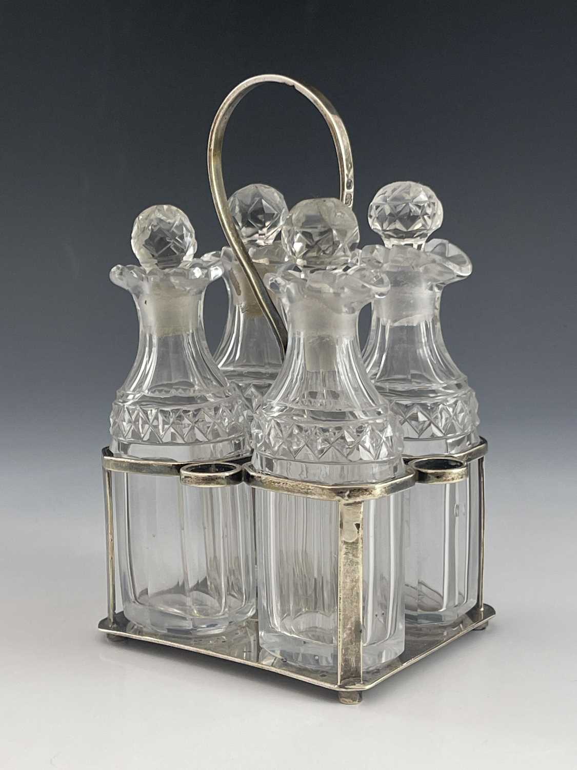 Lot 95 - A George III silver and cut glass cruet and stand, Thomas Wallis, London 1807