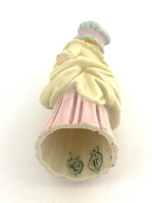 Lot 941 - A Royal Worcester Town Girl candle snuffer,...
