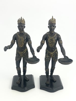 Lot 514 - A pair of bronze Nubian warrior figures,...