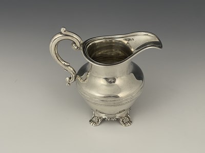 Lot 11 - A Victorian silver cream jug, of squat...