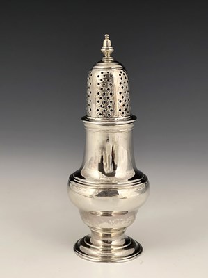 Lot 234 - A George III silver caster, of baluster form...