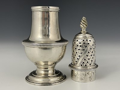 Lot 74 - A George III silver caster, of baluster form...