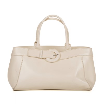 Lot 341 - Furla, a cream handbag, featuring front buckle...