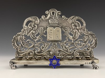 Lot 48 - A Russian silver coloured metal Hanukkah lamp,...