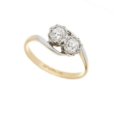 Lot 15 - An 18ct gold old-cut diamond two-stone crossover ring