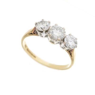 Lot 62 - An 18ct gold diamond three-stone ring