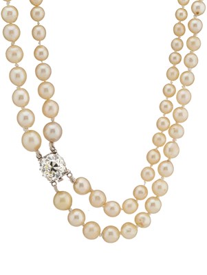 Lot 44 - A mid 20th century pearl two-row necklace, with old-cut diamond clasp