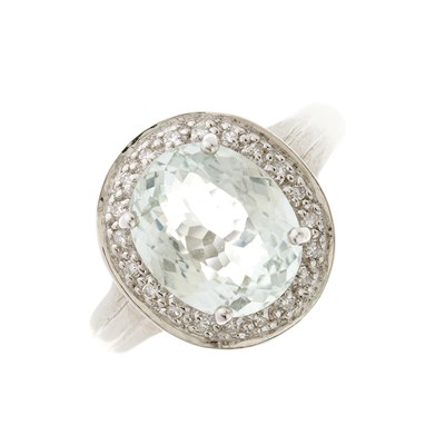 Lot 178 - An 18ct gold aquamarine and diamond cluster ring