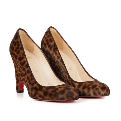 Lot 330 - Christian Louboutin, a pair of Morphing wedge...