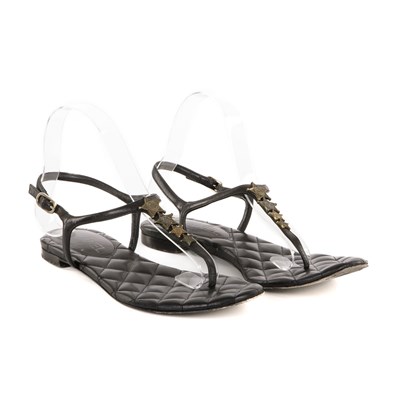 Lot 326 - Chanel, a pair of star thong sandals, crafted...