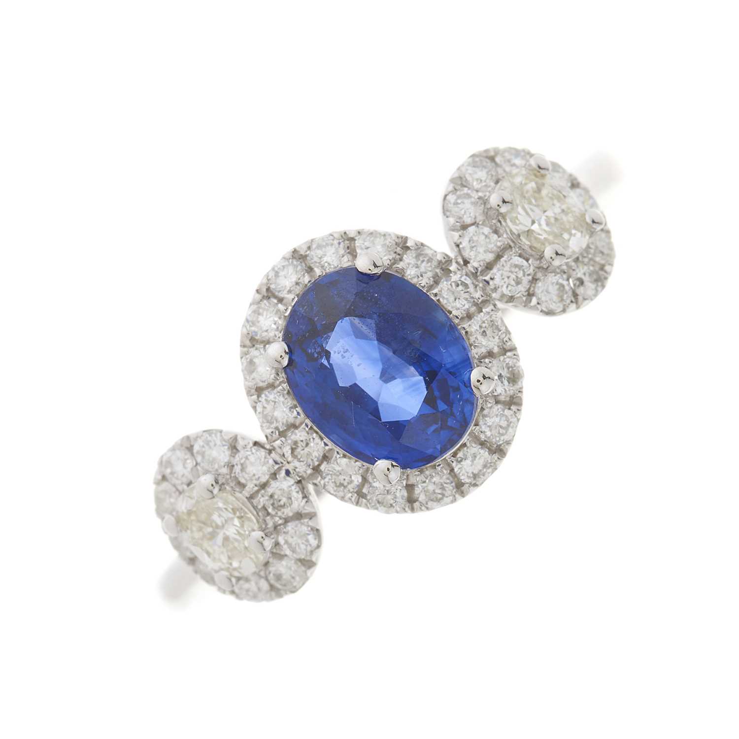 Lot 36 - An 18ct gold sapphire and diamond triple cluster ring