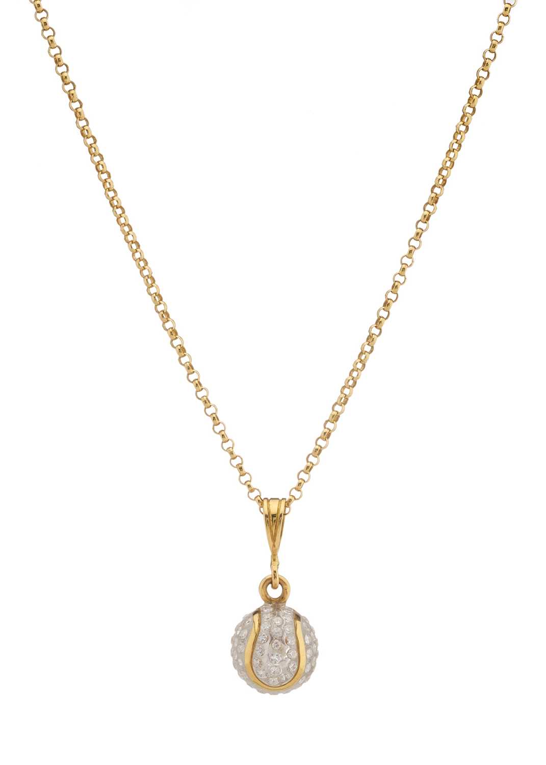 Lot 182 - A gold diamond tennis ball pendant, with chain