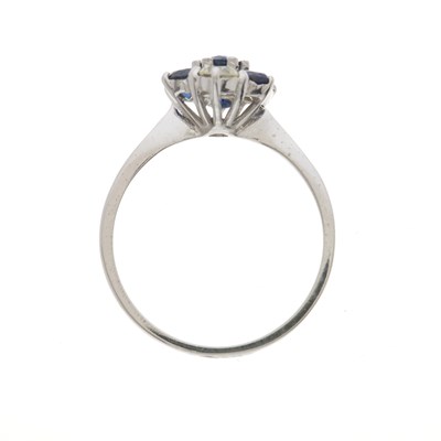 Lot 50 - A mid 20th century sapphire and diamond cluster ring