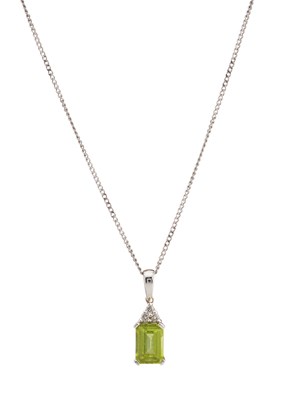 Lot 188 - An 18ct gold peridot and diamond pendant, with chain