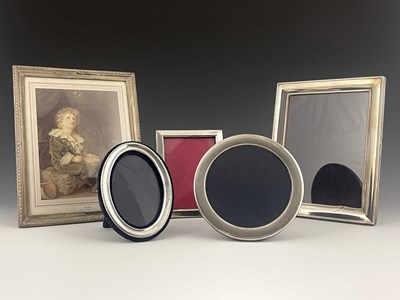 Lot 181 - A collection of silver mounted photograph...