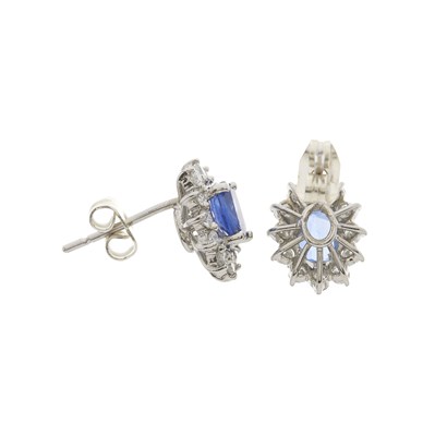 Lot 23 - A pair of gold, sapphire and diamond cluster stud earrings