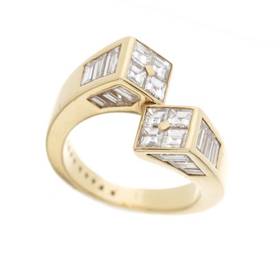 Lot 79 - Boucheron, an 18ct gold diamond crossover ring