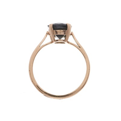 Lot 184 - A 9ct rose gold sapphire single-stone ring