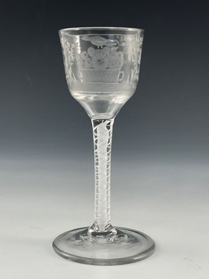 Lot 554 - An engraved opaque twist wine glass, circa...