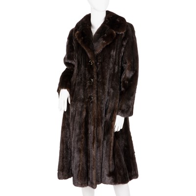 Lot 481 - A knee-length dark ranch mink coat, featuring...