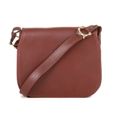 Lot 289 - Cartier, a small Bordeaux flap handbag,...