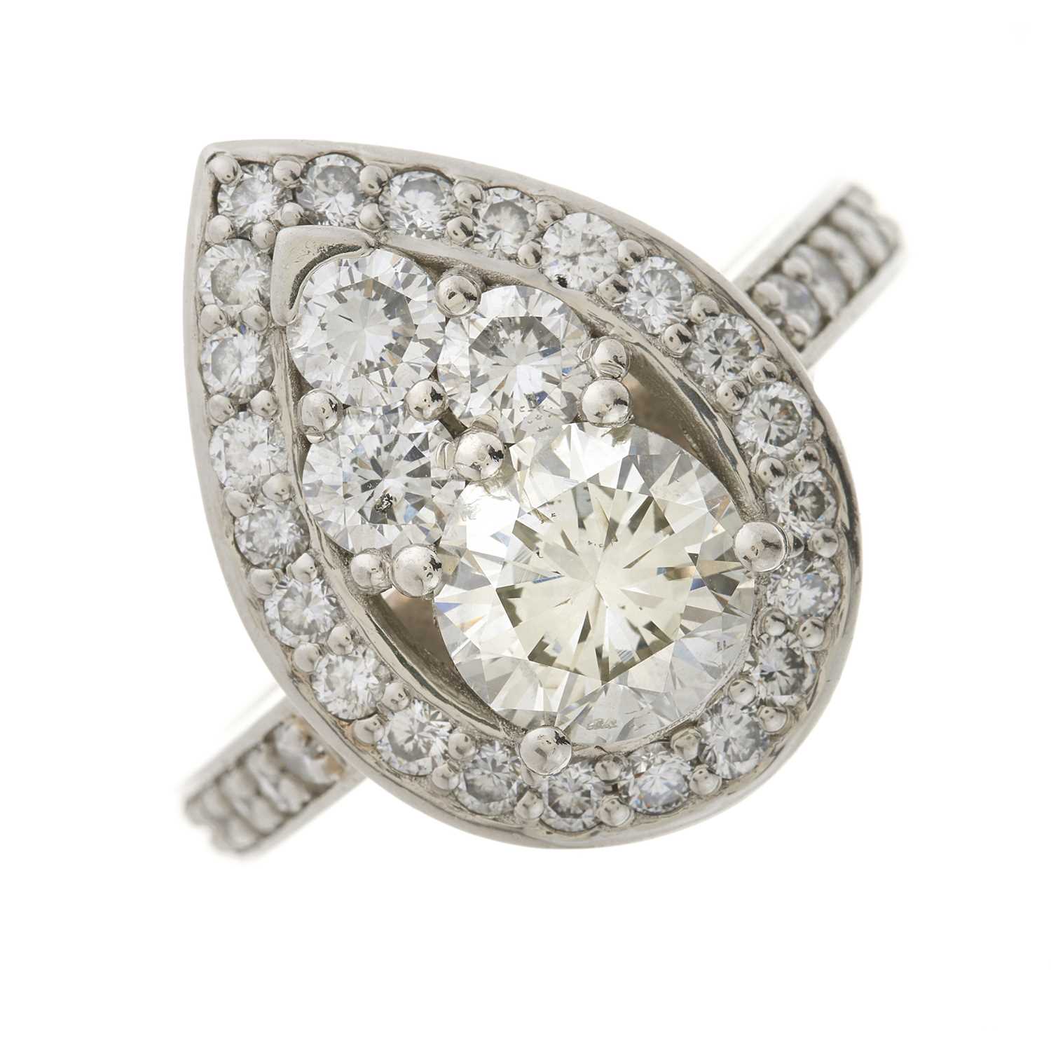 Lot 43 - A platinum and diamond cluster dress ring