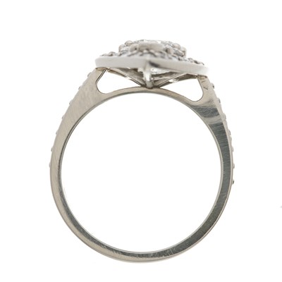 Lot 43 - A platinum and diamond cluster dress ring