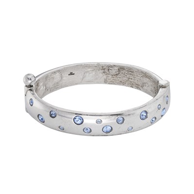 Lot 470 - Yves Saint Laurent, a French silver and blue...