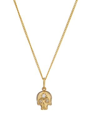 Lot 122 - An 18ct gold diamond skull pendant