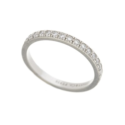 Lot 74 - Tiffany & Co, a platinum diamond half eternity ring