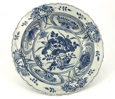 Lot 541 - An Oriental blue and white bowl, painted with...