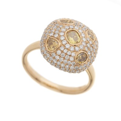 Lot 83 - An 18ct gold fancy yellow diamond and diamond bombe ring
