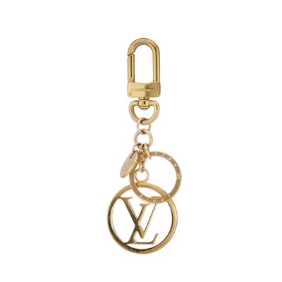 Lot 420 - Louis Vuitton, a gold-tone key holder bag...