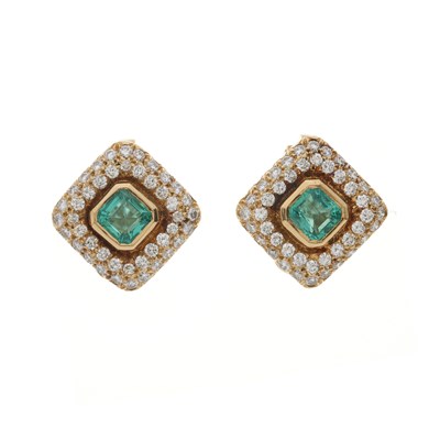 Lot 162 - An exceptional pair of 18ct gold Colombian emerald and diamond cluster clip earrings