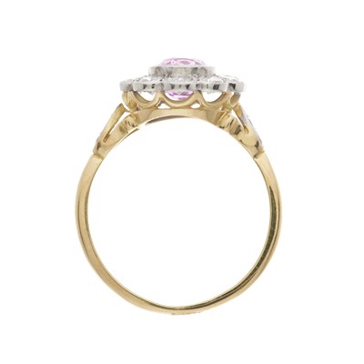 Lot 27 - An 18ct gold and platinum pink sapphire and diamond cluster ring