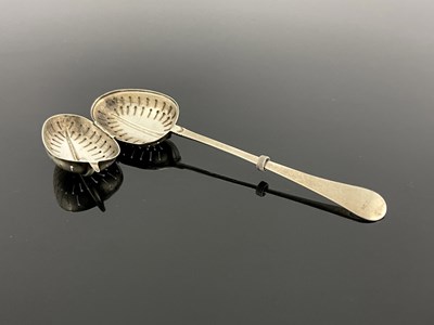 Lot 122 - A Victorian silver "Teaette" tea infuser spoon,...