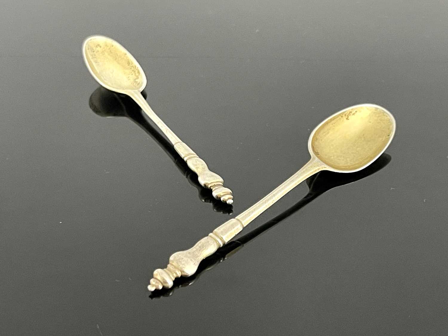 Lot 83 - A pair of Queen Anne silver cast baluster...