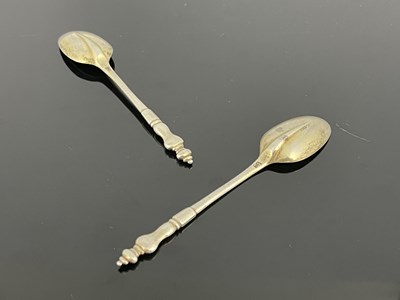Lot 83 - A pair of Queen Anne silver cast baluster...