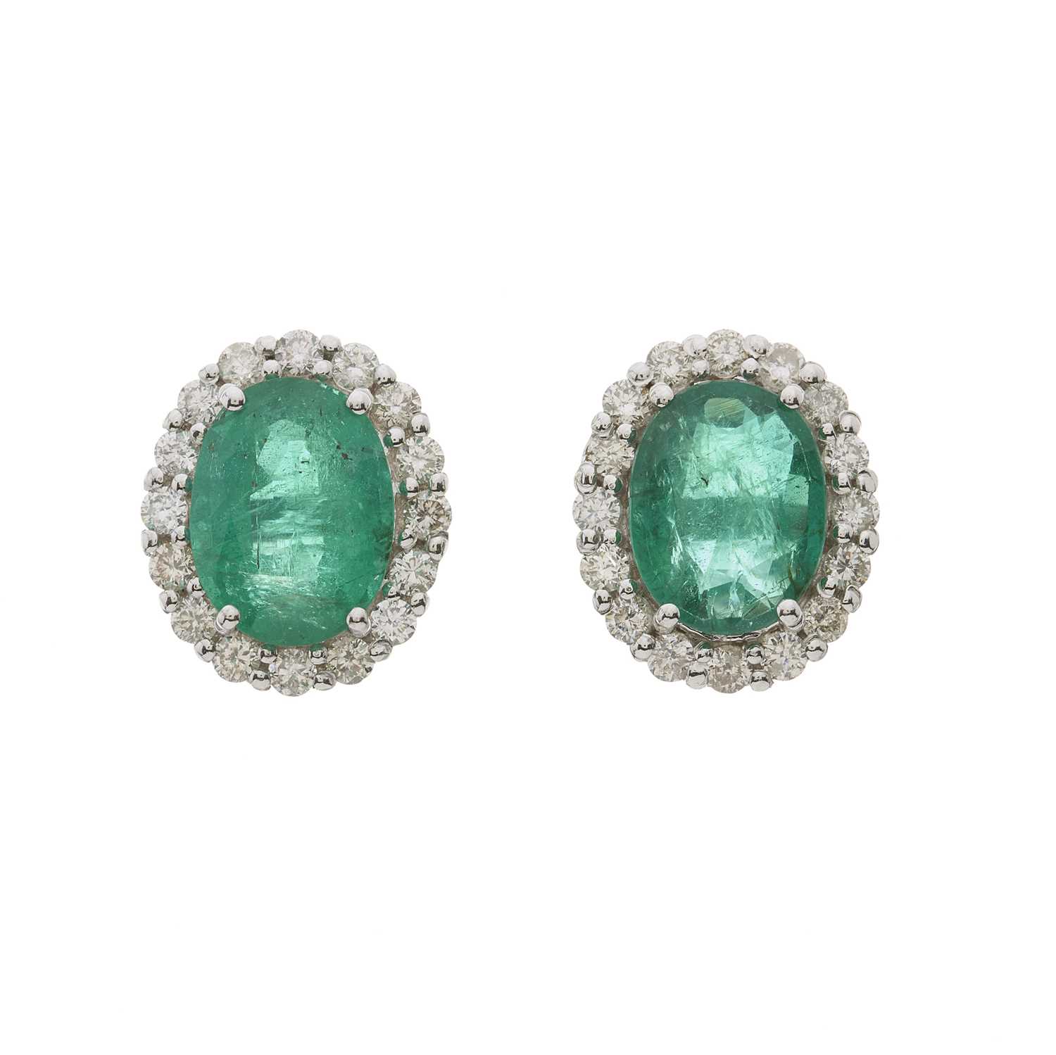 Lot 57 - A pair of 18ct gold emerald and diamond cluster stud earrings