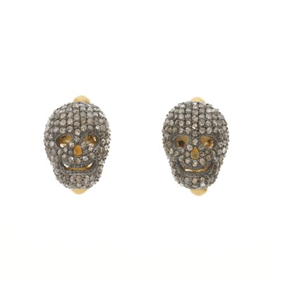 Lot 112 - A pair of pave-set diamond skull cufflinks