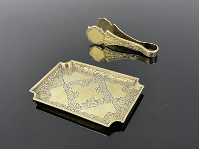 Lot 221 - A Victorian silver gilt lemon wedge squeezer...