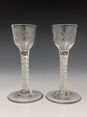 Lot 591 - A pair of air twist wine glasses, circa 1765,...