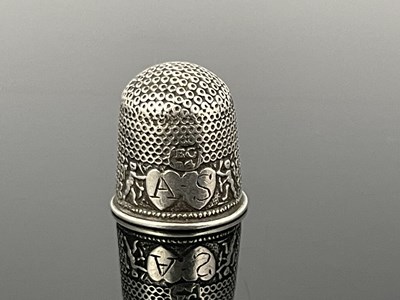 Lot 160 - A seventeenth-century silver thimble, the body...