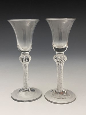 Lot 592 - A near pair of airtwist wine glasses, circa...