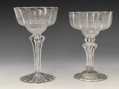 Lot 594 - Two glass optic moulded pedestal sweetmeat...