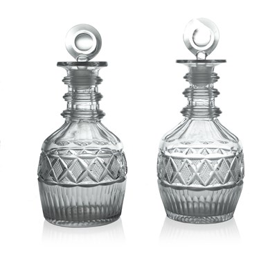 Lot 601 - A pair of Anglo Irish cut glass decanters,...