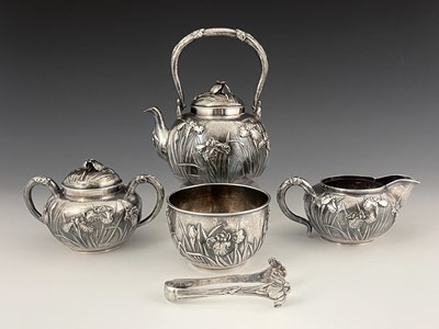 Lot 224 - A Japanese silver five-piece tea set, Meiji...