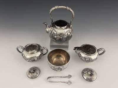 Lot 224 - A Japanese silver five-piece tea set, Meiji...