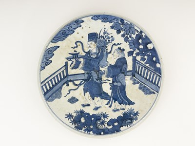 Lot 551 - A Chinese blue and white plaque, circular form,...