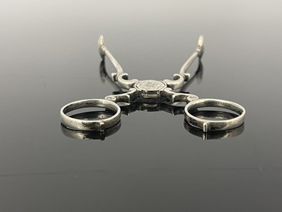 Lot 92 - A pair of Eighteenth-century silver tea tongs,...